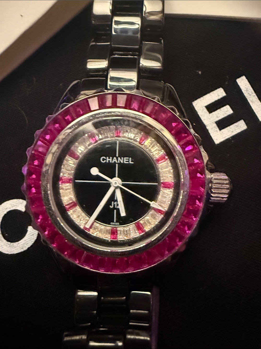 CHANEL Black Dial Watch with Pink Gemstone Bezel